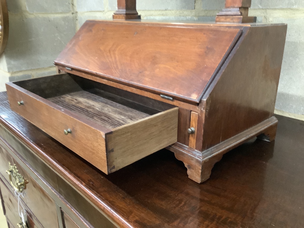 An early 19th century mahogany toilet mirror with bureau base, width 48cm height 76cm